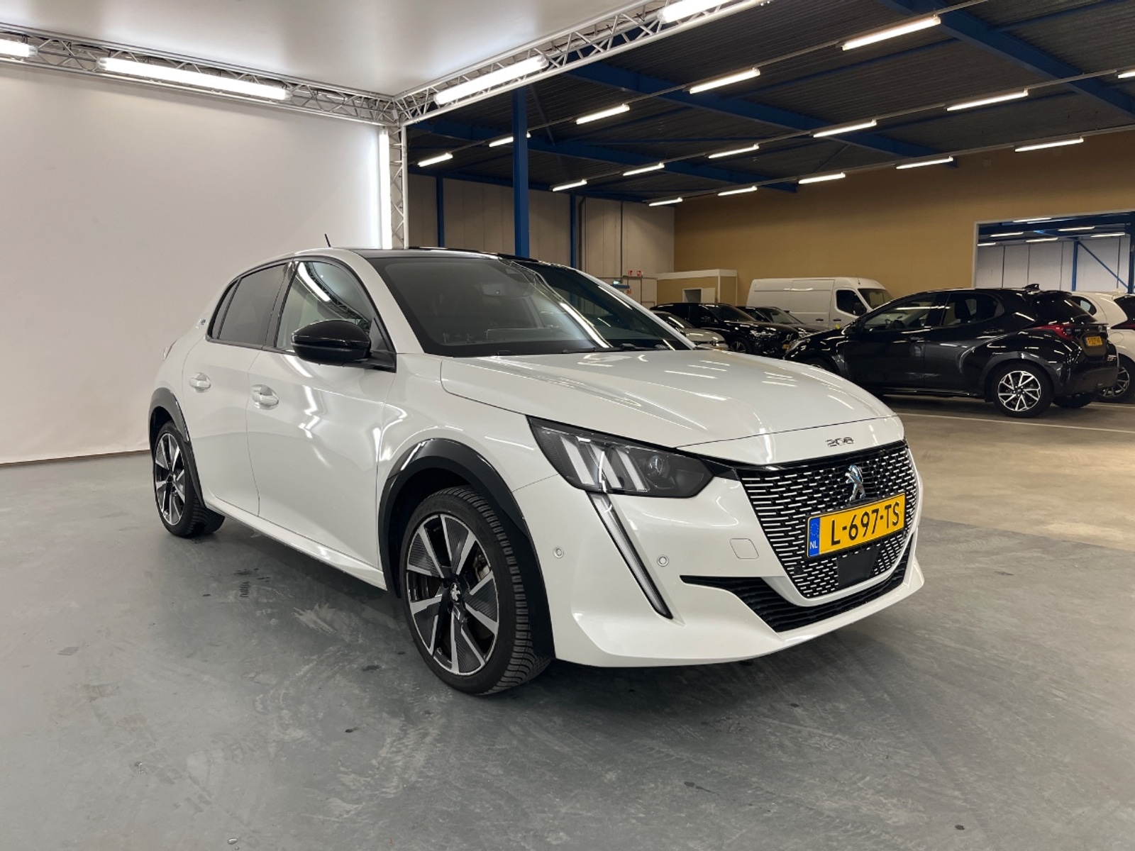 Foto 9 van Peugeot E-208
