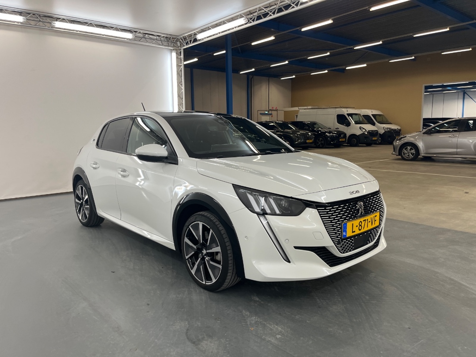Foto 6 van Peugeot E-208